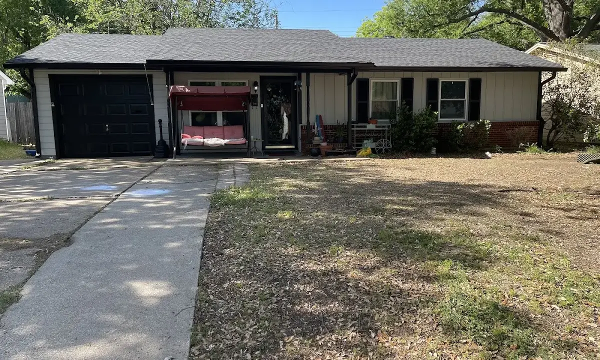 Asphalt Shingle Roof Repair crew at work on a residential roof in Boiling Spring Lakes